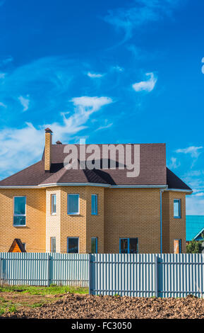 house with a gable roof window Stock Photo