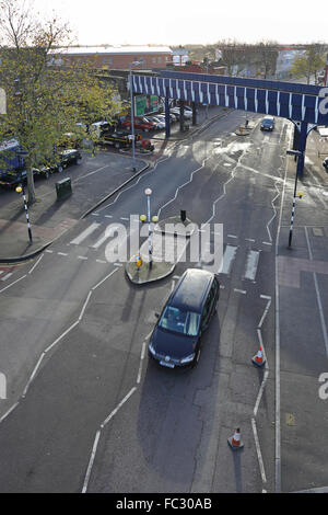 High level view of the railway bridge over High Road Leyton at Leyton Midland Road Station, North London. Shows zebra crossing. Stock Photo