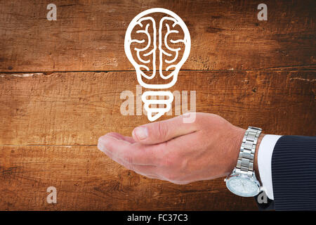 Composite image of businessman in suit offering handshake Stock Photo