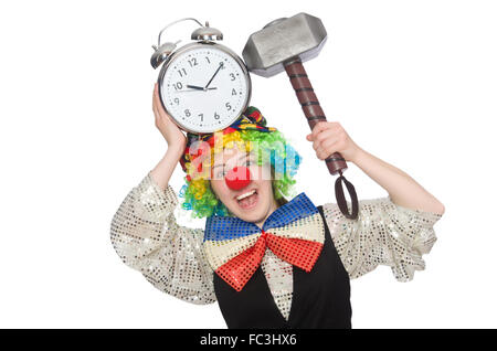 Female clown with alarm-clock and hammer isolated on white Stock Photo