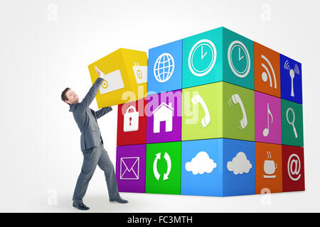 Composite image of businessman with his hands up Stock Photo