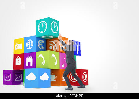Composite image of businessman with his hands up Stock Photo