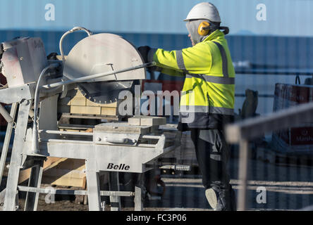 Aberystwyth, West Wales, UK. 20th January 2016. People are out and about enjoying the glorious sunshine and blue skies albeit cold. Workman catch up on the outdoor work whilst the weather holds Credit:  Trebuchet Photography / Alamy Live News Stock Photo