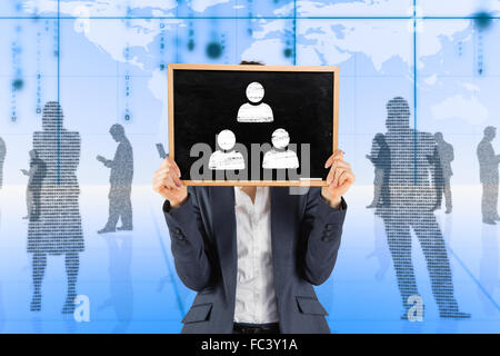 Composite image of businesswoman showing board Stock Photo