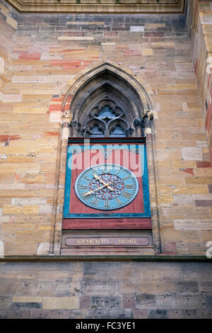 The close-up photo of the clocks of Freiburg Minster, Germany Stock Photo