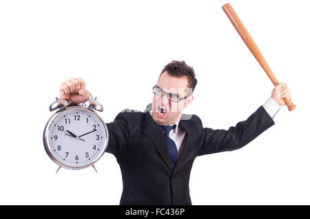 Man hitting the clock with baseball bat isolated on the white Stock Photo