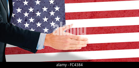 Composite image of businessman ready to shake hand Stock Photo