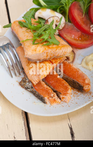 grilled samon filet with vegetables salad Stock Photo
