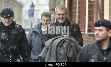 Czech businessman Petr Sisak, centre, and lawyer Ivo Hala, not on the photo, whom the police recently accused in absentia within a case of insolvency fraud, reported to the police today, on Wednesday, January 20, 2016, to give their explanation concerning the alleged manipulation of companies' insolvency, their defence lawyers told CTK. Sisak and Hala are among the 14 people accused within this case that also involves the harming of creditors and influencing of judges. Most of the suspects were arrested during the raid. The police failed to arrest Sisak and Hala during a raid on the Spolchemie Stock Photo