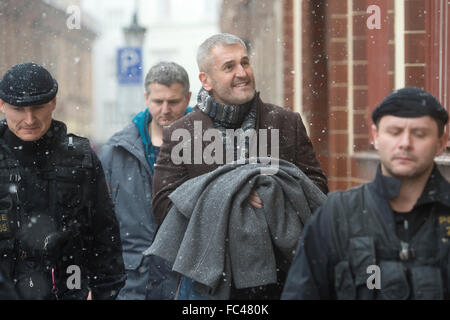 Czech businessman Petr Sisak, centre, and lawyer Ivo Hala, not on the photo, whom the police recently accused in absentia within a case of insolvency fraud, reported to the police today, on Wednesday, January 20, 2016, to give their explanation concerning the alleged manipulation of companies' insolvency, their defence lawyers told CTK. Sisak and Hala are among the 14 people accused within this case that also involves the harming of creditors and influencing of judges. Most of the suspects were arrested during the raid. The police failed to arrest Sisak and Hala during a raid on the Spolchemie Stock Photo