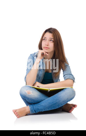 College girl holding books and thinking Stock Photo - Alamy
