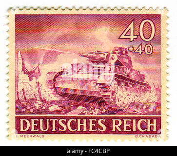 GOMEL,BELARUS - JANUARY 2016: A stamp printed in Germany shows image of the German tank, circa 1942. Stock Photo