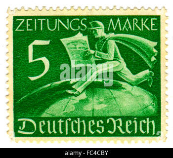 GOMEL,BELARUS - JANUARY 2016: A stamp printed in Germany shows image of the German newspaper, circa 1942. Stock Photo