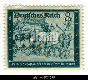 GOMEL,BELARUS - JANUARY 2016: A stamp printed in Germany shows image of the German coach, circa 1942. Stock Photo