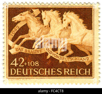 GOMEL,BELARUS - JANUARY 2016: A stamp printed in Germany shows image of The Brown band of Germany, circa 1942. Stock Photo