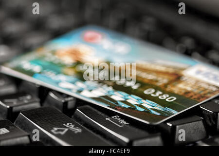 Close- up view on payment card na keyboard Stock Photo