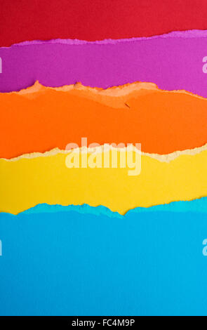 Abstract of torn pieces of colourful paper Stock Photo