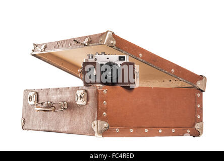 Old camera in an old suitcase. Stock Photo