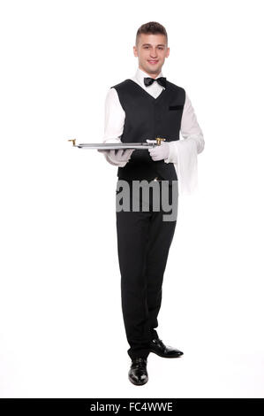 A young boy waiter with a tray Stock Photo