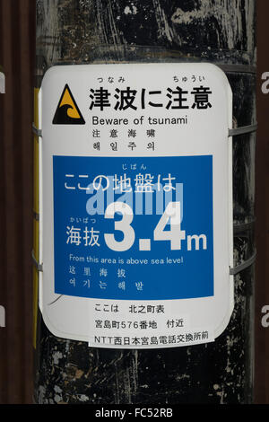 Tsunami warning sign Miyajima Japan Stock Photo