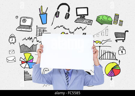 Composite image of portrait of a businessman hiding his face behind a blank panel Stock Photo