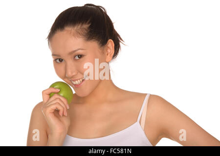 happy asian woman with green apple Stock Photo