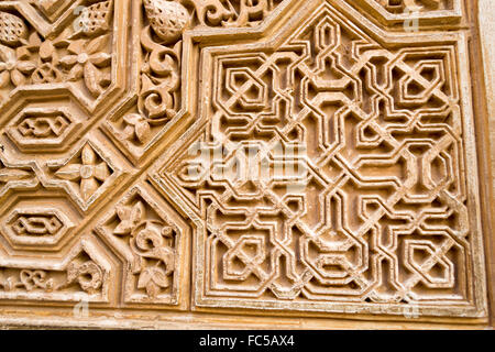 Carving on a wall in Alhambra Stock Photo