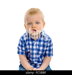 blue-eyed boy in a plaid shirt Stock Photo