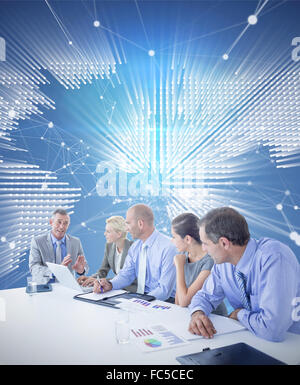 Composite image of business team having a meeting Stock Photo