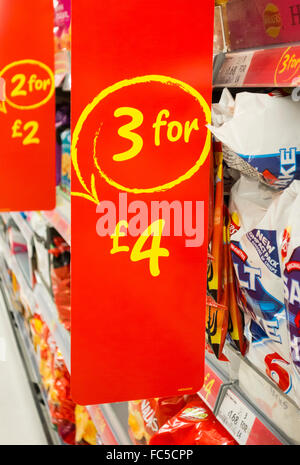 3 for £4 offer on large bags of crisps in Asda supermarket. UK Stock Photo