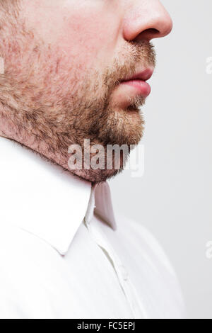 young man with a double chin - the result of poor lifestyle Stock Photo