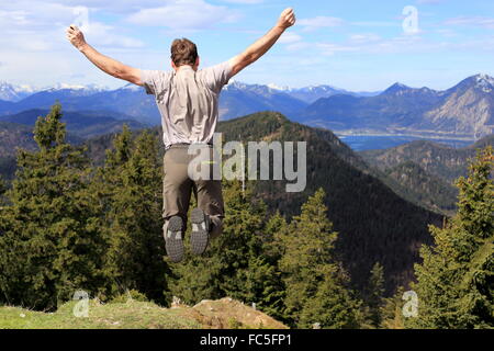 lucky man on mountain Stock Photo