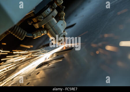 Laser cutting of metal sheet, close-up Stock Photo