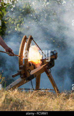 Cannon fire - white smoke in the background Stock Photo