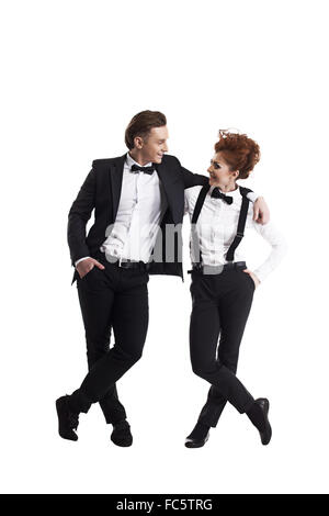 Attractive young colleagues posing in embrace Stock Photo
