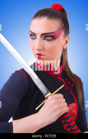 Woman in japanese martial art concept Stock Photo