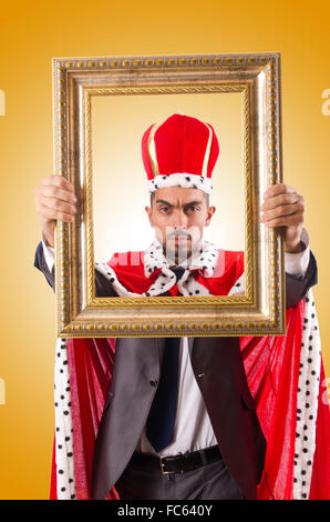 King with picture frame on white Stock Photo