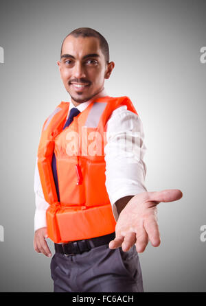 Man in life jacket isolated on white Stock Photo