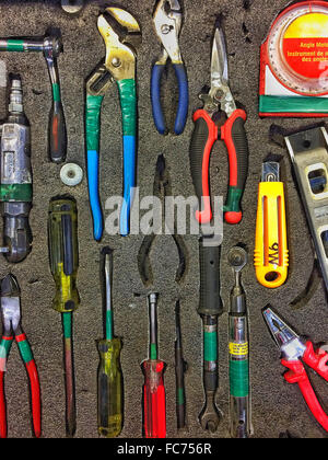 Tools arranged in foam container Stock Photo