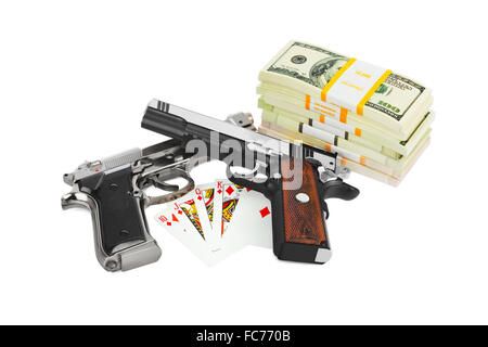 Guns money and playing cards Stock Photo