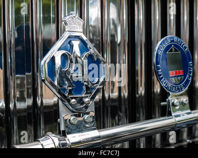 Vintage RAC (Royal Automobile Club) badge and Rolls Royce Enthusiasts badges on badge bar of a vintage Rolls Royce Stock Photo