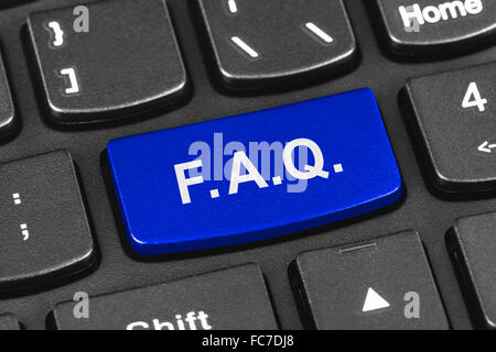 Computer notebook keyboard with FAQ key Stock Photo