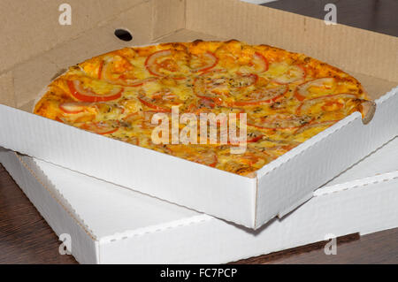Margarita Pizza Delivery in cardboard boxes Stock Photo