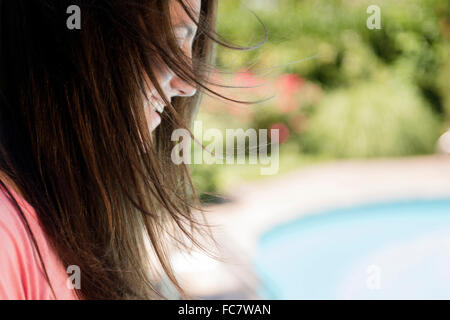 Profile of Caucasian woman outdoors Stock Photo