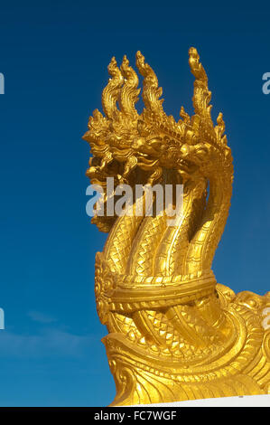 Seven head naga sculpture at the base of main pagoda in Wat Nong Bua temple, Ubon Ratchathani province, North eastern of Thailan Stock Photo