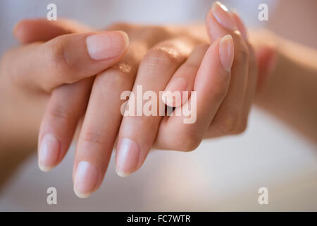 Close up of hands of Hispanic woman Stock Photo