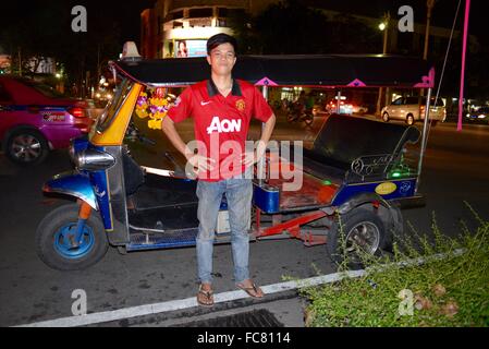 Manchester United Tuk Tuk Driver Stock Photo
