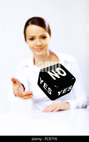 Image of a flying dice as symbol of risk and luck Stock Photo