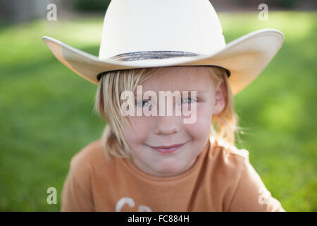 Caucasian boy in cowboy hat Stock Photo