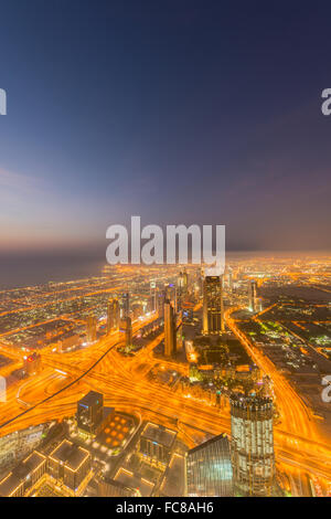 Panorama of night Dubai during sunset Stock Photo